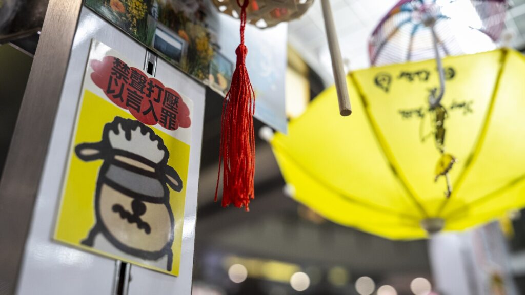 Hong Kong's security net extends beyond arrests as small businesses pressured