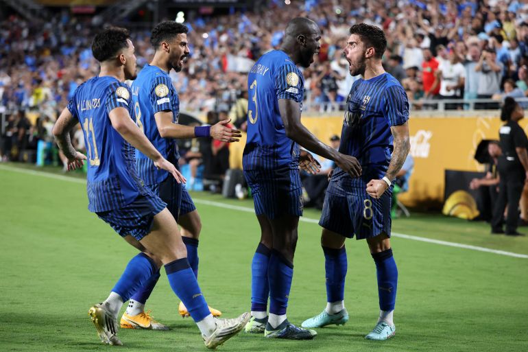 Al Hilal players react.