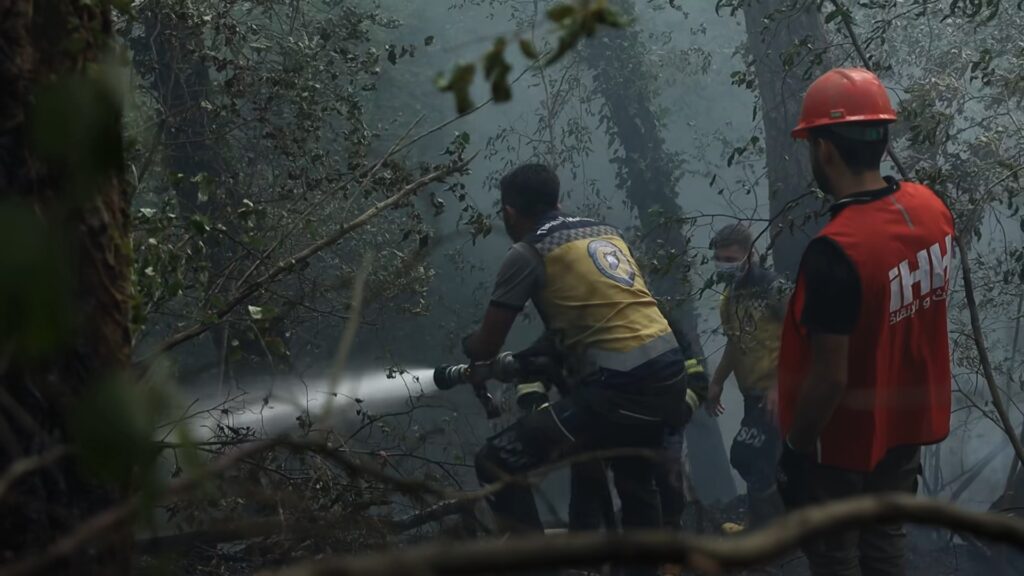 ‘We belong to this land’: Syrians navigate landmines to battle wildfires ‘We belong to this land’: Syrians navigate landmines to battle wildfires
