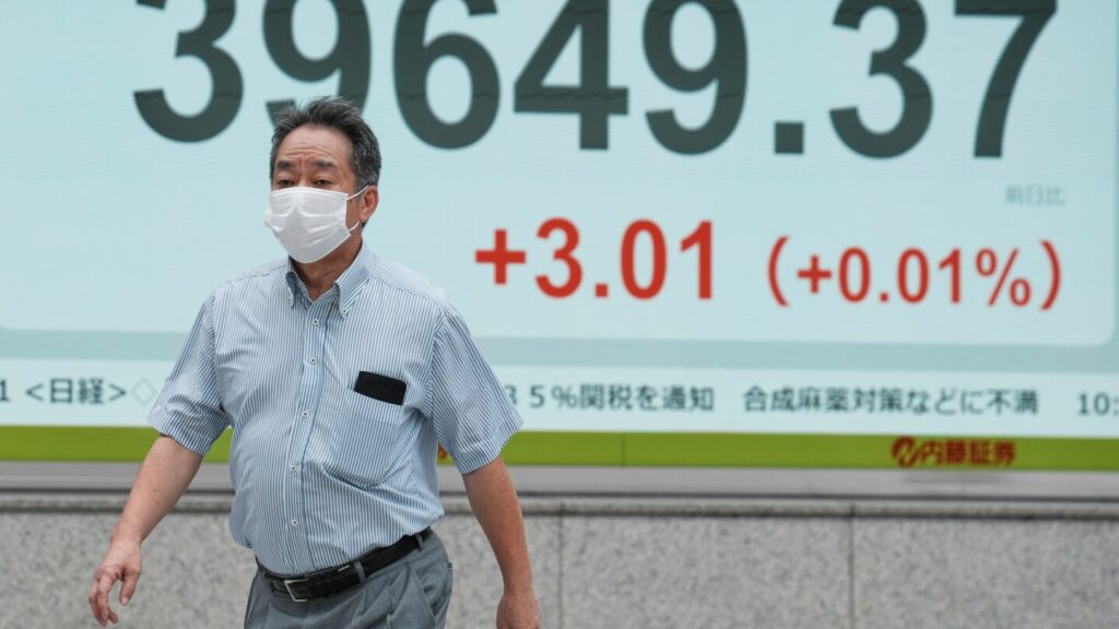 Asian shares are mixed after Wall Street closes higher and edges to more records Asian shares are mixed after Wall Street closes higher and edges to more records