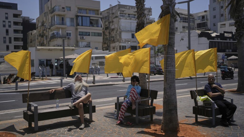 Israeli airstrikes kill 14 Palestinians in Gaza and another 10 die seeking food