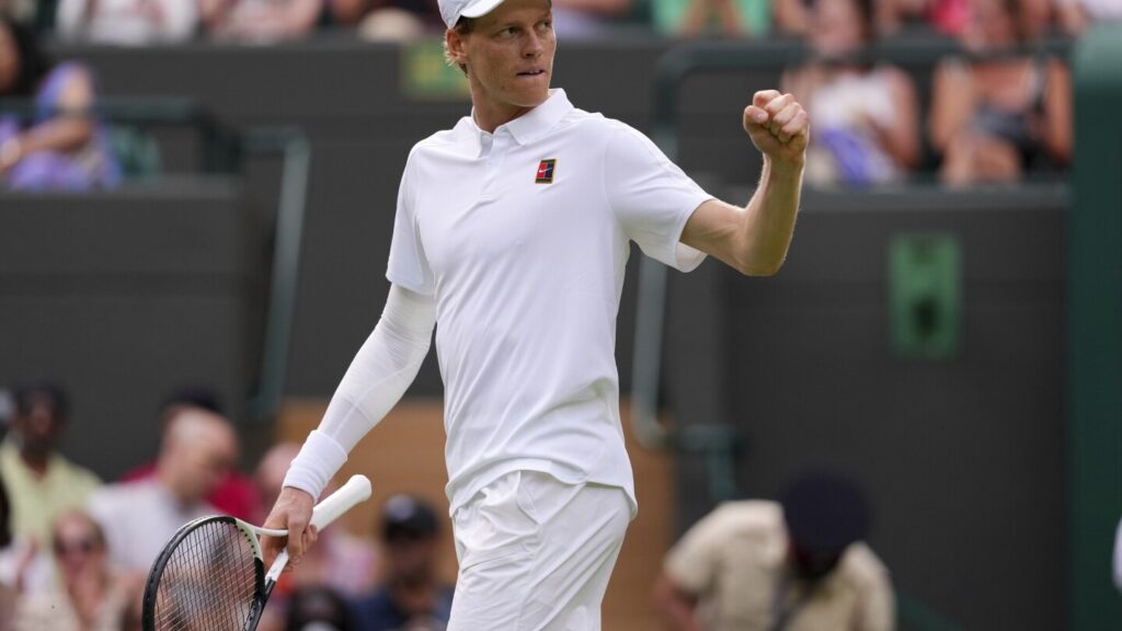 Jannik Sinner beats Ben Shelton to reach Wimbledon's semifinals with a sleeve on his injured elbow