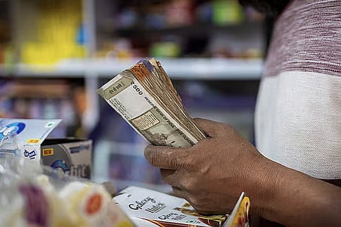 Indian rupee may hit new low as dollar rally, tariffs, outflows threaten currency Indian rupee may hit new low as dollar rally, tariffs, outflows threaten currency