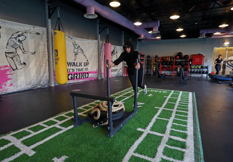 Saudi woman, Fayrouz Al-Omari, works out at a gym