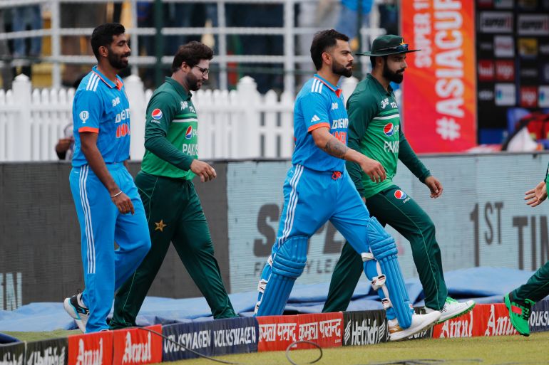 COLOMBO, SRI LANKA - SEPTEMBER 10: Shadab Khan of Pakistan (R) , Virat Kohli of India (2R) , Imam ul Haq of Pakistan (C) and Jasprit Bumrah of India (L) during the Asia Cup Super Four match between India and Pakistan at R. Premadasa Stadium on September 10, 2023 in Colombo, Sri Lanka. (Photo by Surjeet Yadav/Getty Images)