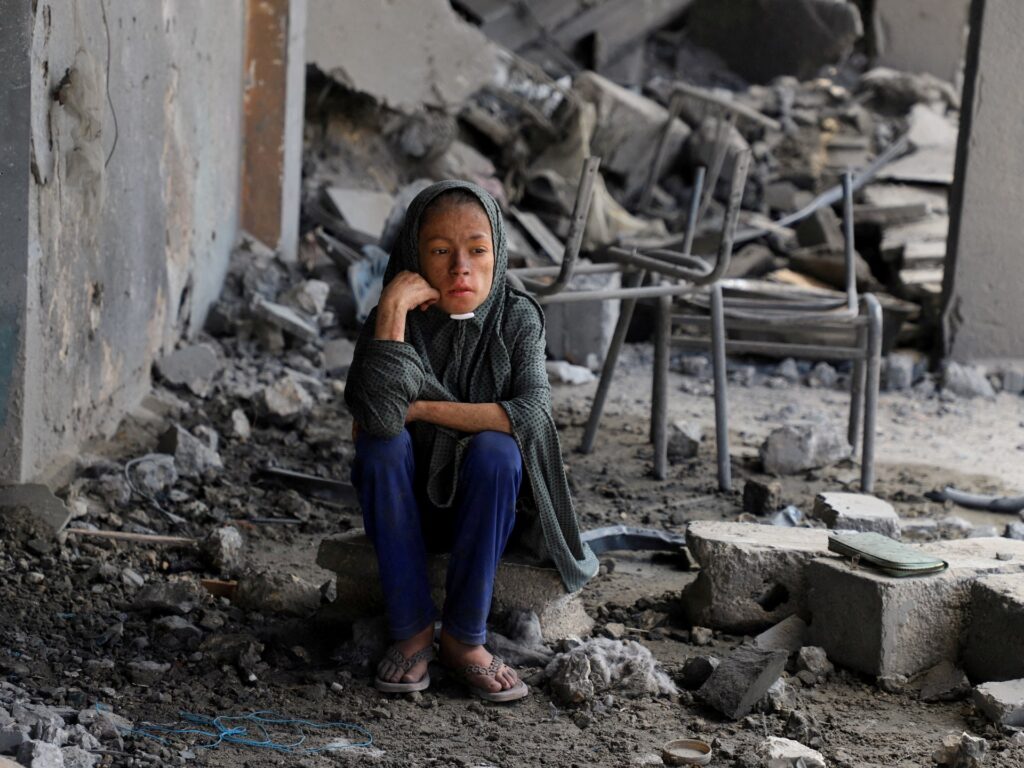 Israel threatens all staying in Gaza City, kills at least 13 in enclave Israel threatens all staying in Gaza City, kills at least 13 in enclave