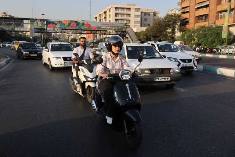 Female motorcycling in Iran