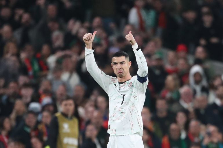 Portugal's Cristiano Ronaldo leaves the pitch after being shown a red card