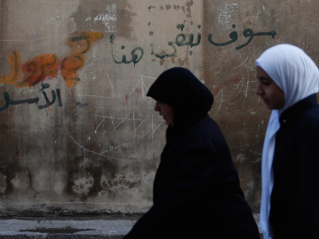 Syria extends Homs curfew as killings threaten to inflame sectarian tension Syria extends Homs curfew as killings threaten to inflame sectarian tension