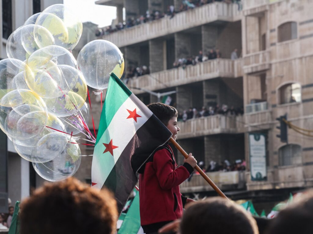 Hope, flags, fireworks as Syria starts to celebrate a year without al-Assad Hope, flags, fireworks as Syria starts to celebrate a year without al-Assad