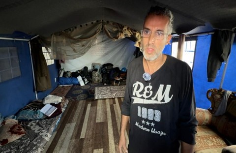 Wissam Naser, a displaced Palestinian sheltering in a tent in Gaza City.