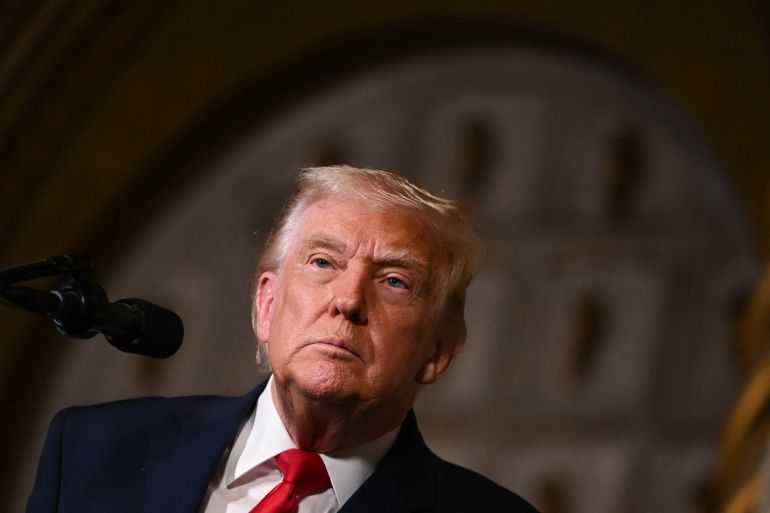 US President Donald Trump takes questions from journalists after announcing the US Navys new Golden Fleet initiative, unveiling a new class of warships, at Mar-a-Lago in Palm Beach, Florida, on December 22, 2025. President Donald Trump on December 22 announced a new class of heavily armed warships that will be named after himself -- an honor usually reserved for US leaders who have left office. Two of the Trump-class ships will be built initially but that number could grow substantially in the future, according to the president, who said they will be "some of the most lethal surface warfare ships" and "the largest battleship in the history of our country." Trump made the announcement at his Mar-a-Lago residence in Florida alongside Pentagon chief Pete Hegseth, Secretary of State Marco Rubio and Navy Secretary John Phelan, with images of the planned high-tech vessels on stands nearby. (Photo by ANDREW CABALLERO-REYNOLDS / AFP)
