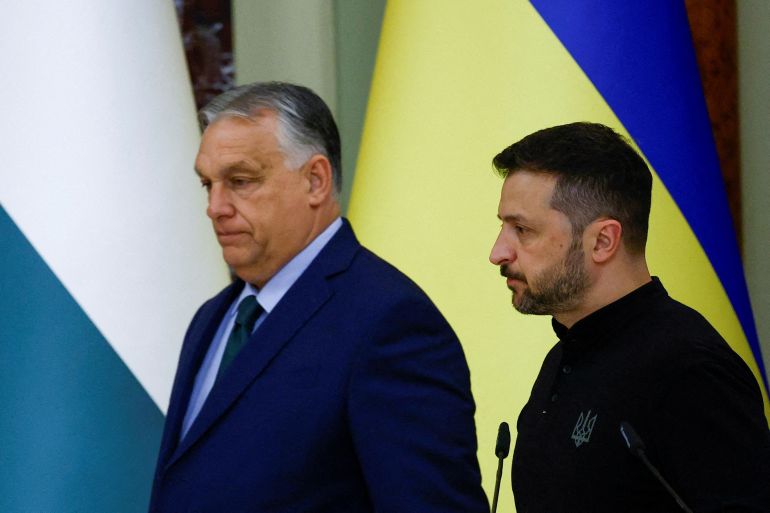 FILE PHOTO: FILE PHOTO: Hungary's Prime Minister Viktor Orban and Ukrainian President Volodymyr Zelenskiy arrive for a joint news briefing, amid Russia's attack on Ukraine, in Kyiv, Ukraine July 2, 2024. REUTERS/Valentyn Ogirenko/File Photo/File Photo