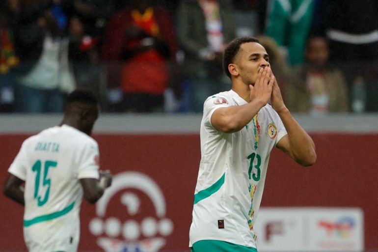 Senegal's forward Iliman Ndiaye celebrates scoring his team's first goal during the Africa Cup of Nations (CAN) quarter-final football match between Mali and Senegal