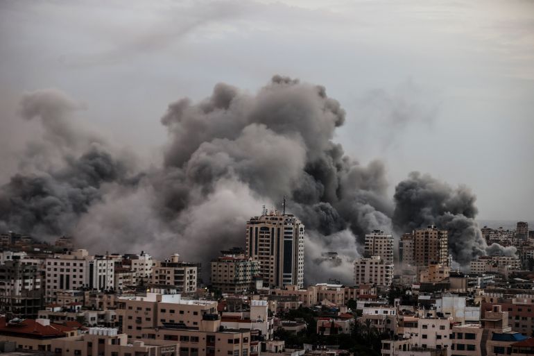 GAZA CITY, GAZA - OCTOBER 09: Smoke rises over the buildings as the Israeli airstrikes continue in Al-Rimal Neighbourhood of Gaza City, Gaza on October 9, 2023. ( Ali Jadallah - Anadolu Agency )