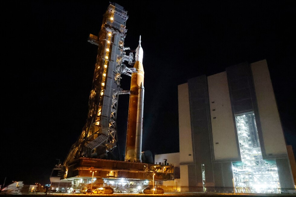 NASA hauls its repaired moon rocket from the hangar back to the pad for an early April launch NASA hauls its repaired moon rocket from the hangar back to the pad for an early April launch