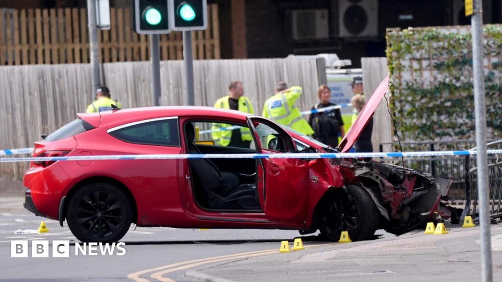 Several injured after car crashes into multiple pedestrians in UK town, police sayOne man sustained life-threatening injuries. The car was abandoned and a search is under way for the driver, police say.