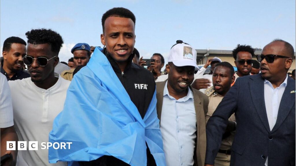 US official says banned referee had links with 'terror organisations'Somali referee Omar Artan was denied entry because of his "association with suspected members of terror organisations," says a US official. Artan has told US media he has no knowledge of the al-Shabab group.37 mins agoWorld Cup