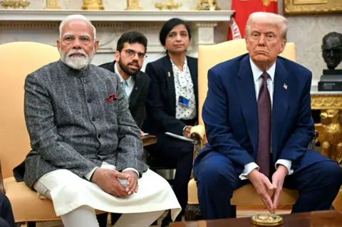 AFP via Getty Images US President Donald Trump speaks with the press as he meets with Indian Prime Minister Narendra Modi in the Oval Office of the White House in Washington, DC, on February 13, 2025