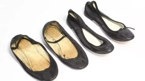 Millon Brigitte Bardot's worn black leather ballet flats. One pair is heavily worn. 
