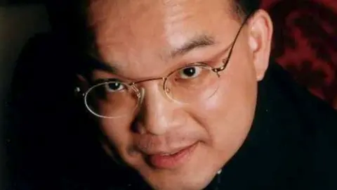 Peel Regional Police / PA Wire Close up image of Kenneth Law's face. He is looking at the camera and is wearing glasses.