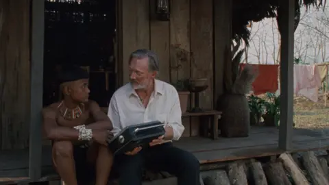 George Pimentel Douglas Henshall with a young boy from the cast, seen at the shoot of Angh 