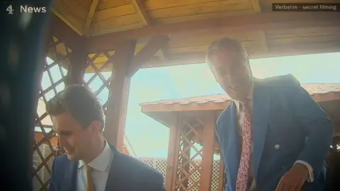 Channel 4/Verbatim A shot of Dan Jukes and Nigel Farage in the Channel 4 News report.