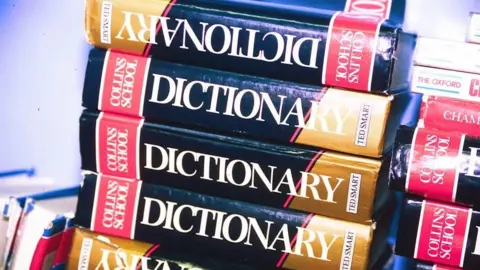 Reuters A pile of dictionaries 