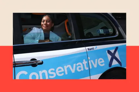 Getty Kemi Badenoch campaigning in a taxi