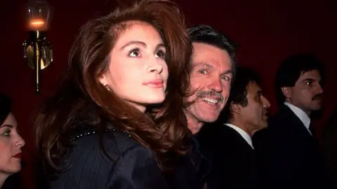 Getty Images Julia Roberts and Tom Skerritt attend the premiere of "Steel Magnolias" at the Ziegfeld Theatre in New York City on November 5, 1989. 


