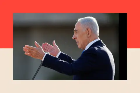 Reuters A side-on picture of Benjamin Netanyahu speaking at a lectern