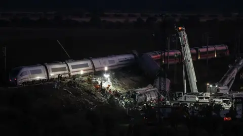 Europa Press via Getty Images Emergency services personnel are working with torches at the scene of the incident, on 28 October, 2026 in Urda, Toledo, Castilla-La Mancha, Spain.