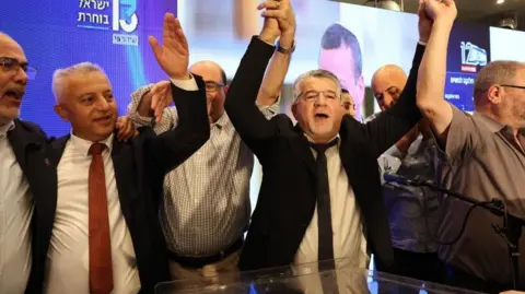 EPA Yousef Jabareen and others celebrate