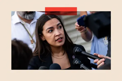 Reuters Alexandria Ocasio-Cortez speaking into a microphone