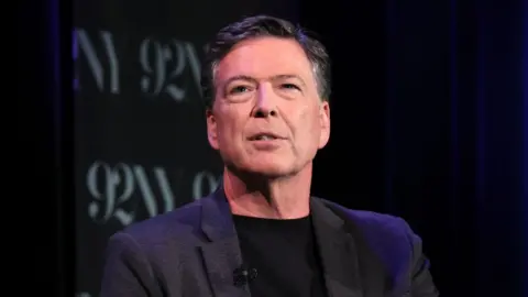 Getty Images NEW YORK, NEW YORK - MAY 30: James Comey speaks onstage during Former FBI Director James Comey In Conversation With MSNBC's Nicolle Wallace at 92NY on May 30, 2023 in New York City. (Photo by Dia Dipasupil/Getty Images)
