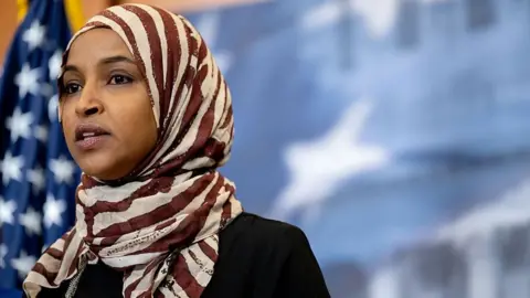 Getty Images Ilhan Omar speaks at a news conference in Washington DC ahead of President Donald Trump's 2026 State of the Union address