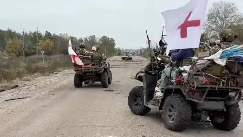 Reuters Russian sappers demining the road out of Oleshky since Tuesday
